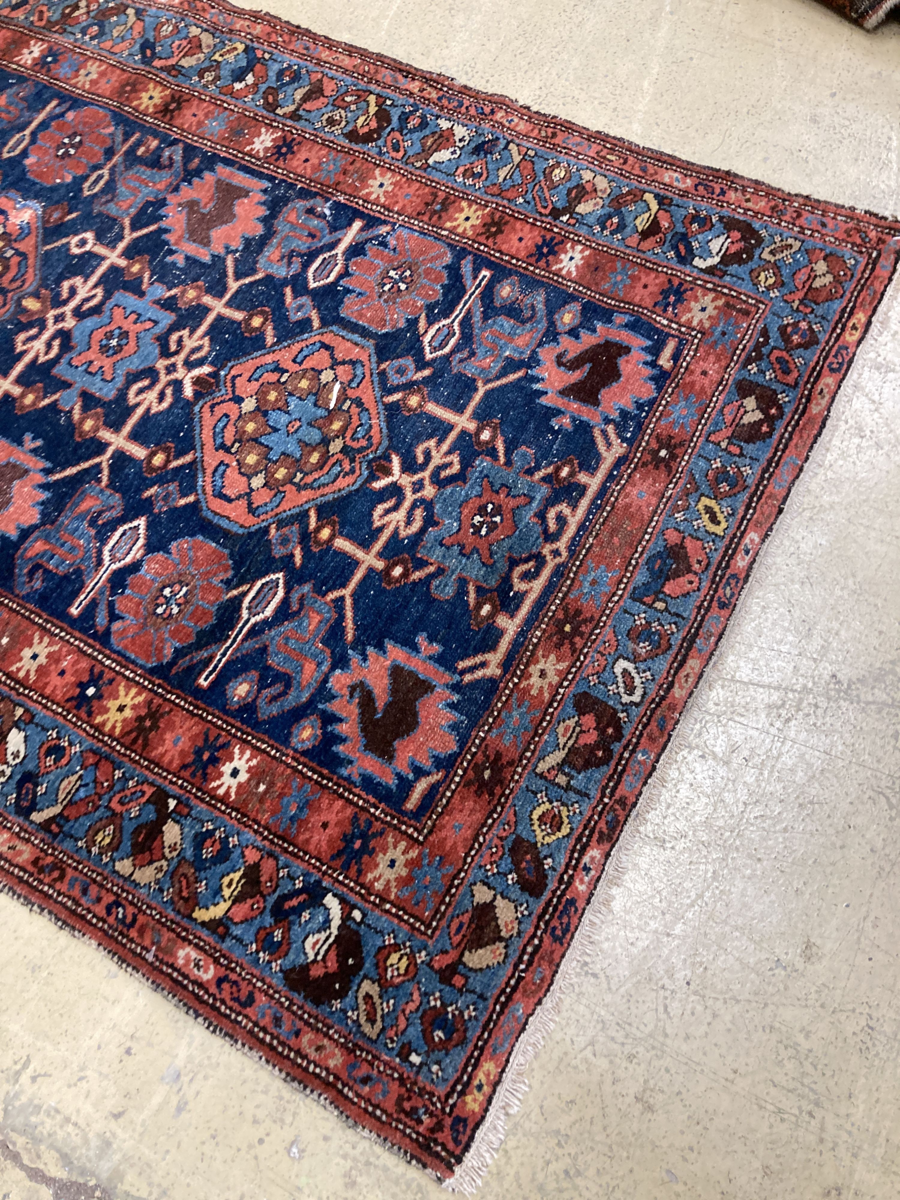 An antique Hamadan blue ground rug, 180 x 104cm